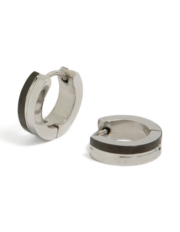 Showcasing statement huggie earrings crafted from waterproof stainless steel with enamel inlay in silver and black front view