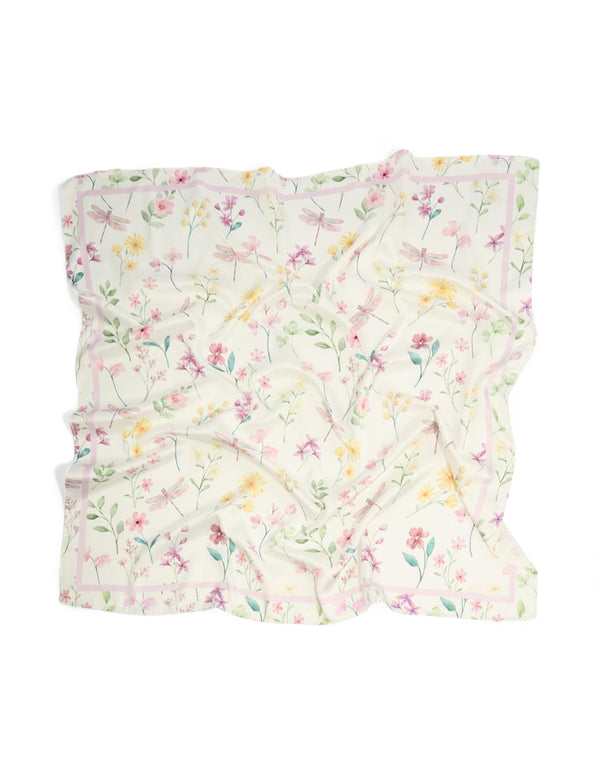 Crafted from fabric this scarf displays a floral print with leaf details in ivory light pink moccasin and pale green hues detail view
