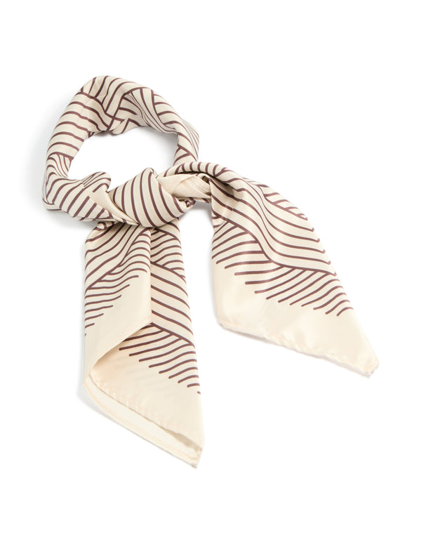 Showcasing a cream brown geometric wavy lines fabric scarf in cornsilk front view