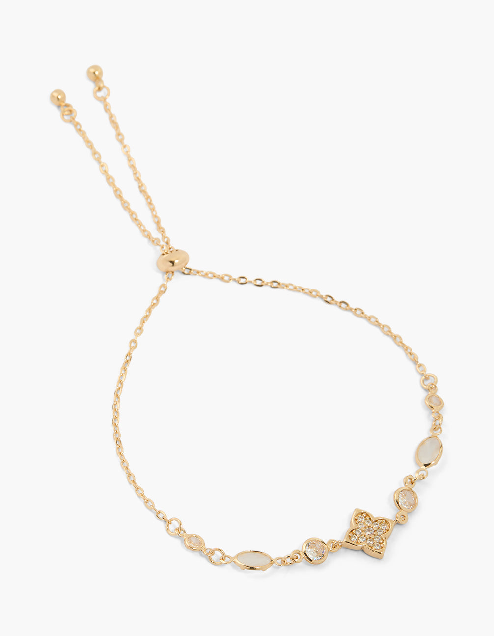 Crafted from cubic zirconia with floral and oval stone in gold front view