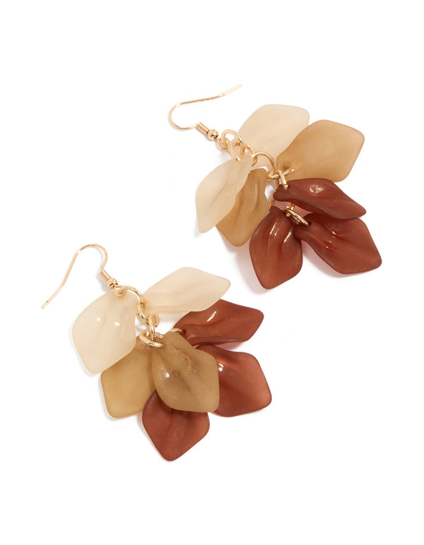 Showcasing statement drop earrings featuring floral petal in gold, tan, and sienna tones front view