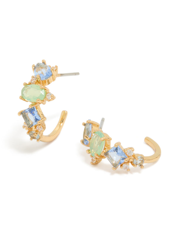 Crafted from gold plated metal, these blue and green cubic zirconia multi-shaped hoop earrings feature sky blue and pale green stones in a front view