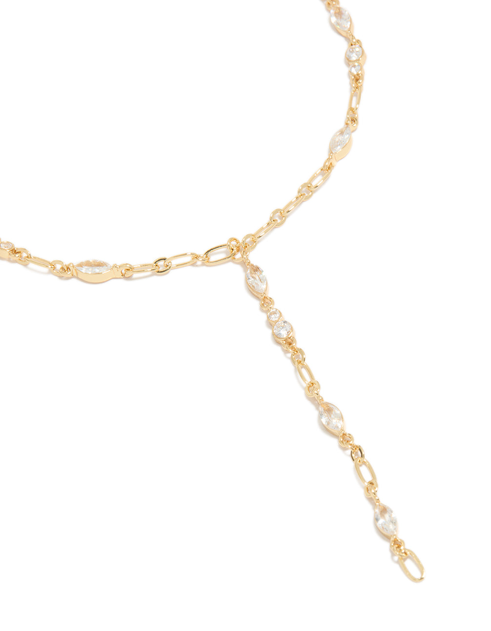 Showcasing a gold plated cubic zirconia bezel chain Y-necklace in gold close up view