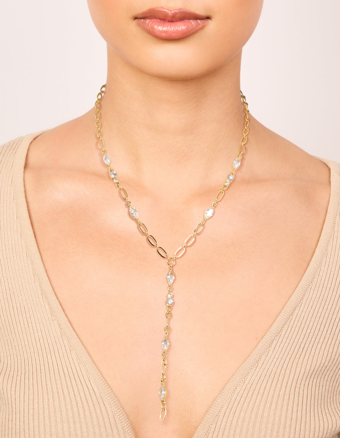 Elegant gold plated cubic zirconia bezel chain Y-necklace worn on neck view