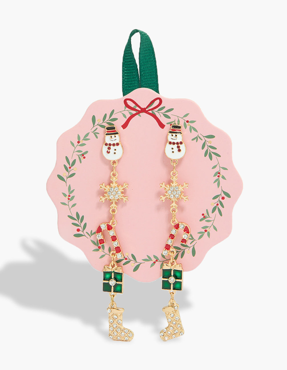 Showcasing chunky statement earrings featuring snowflake elements and snowman & stocking in gold front view
