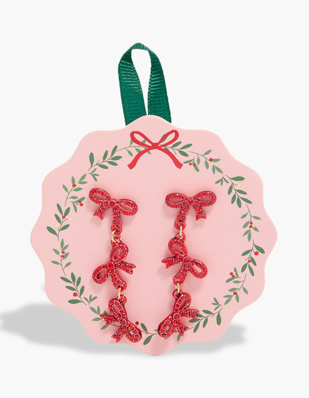Featuring gold triple red bow drop earrings with charm accents front view