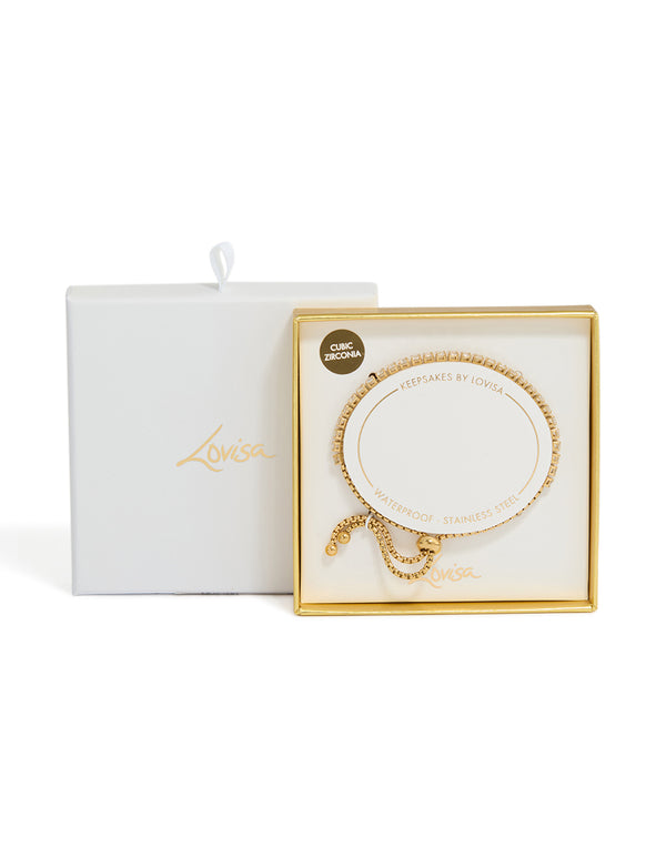 Featuring waterproof gold plated stainless steel construction, this cubic zirconia tennis toggle bracelet is elegantly packaged close up view
