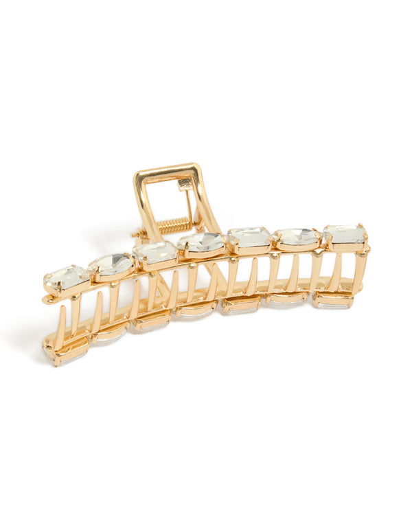 Showcasing a gold diamante hair claw clip with ivory embellishments front view