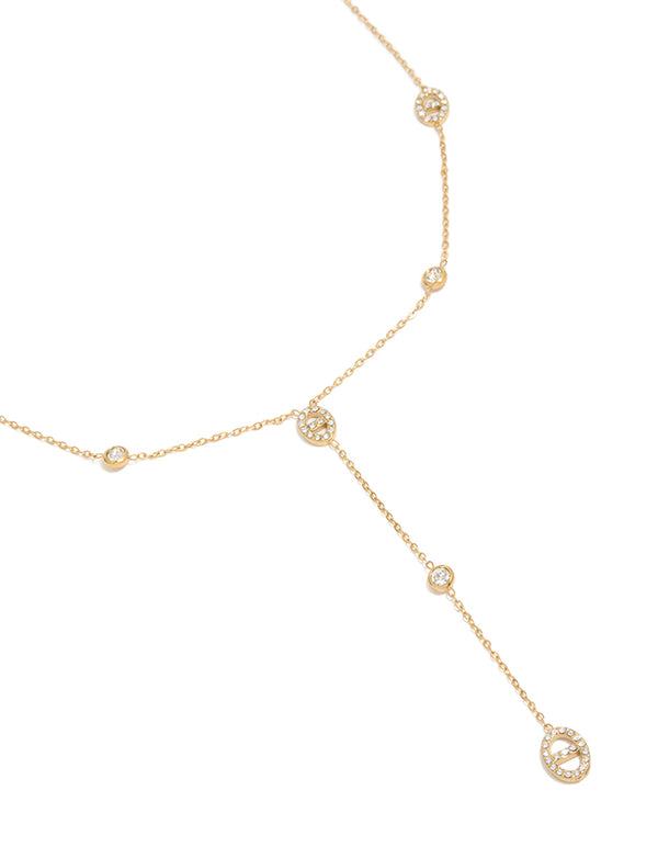 Discover a waterproof Y-necklace crafted from stainless steel with cubic zirconia in oval station settings and gold plated finish close up view