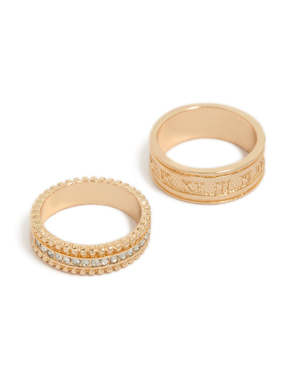 Showcasing a numeral band rings in gold featuring diamante details 2-pack front view