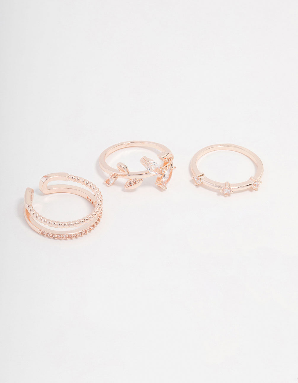 Beautifully crafted set of rose gold plated cubic zirconia leafy station rings front view