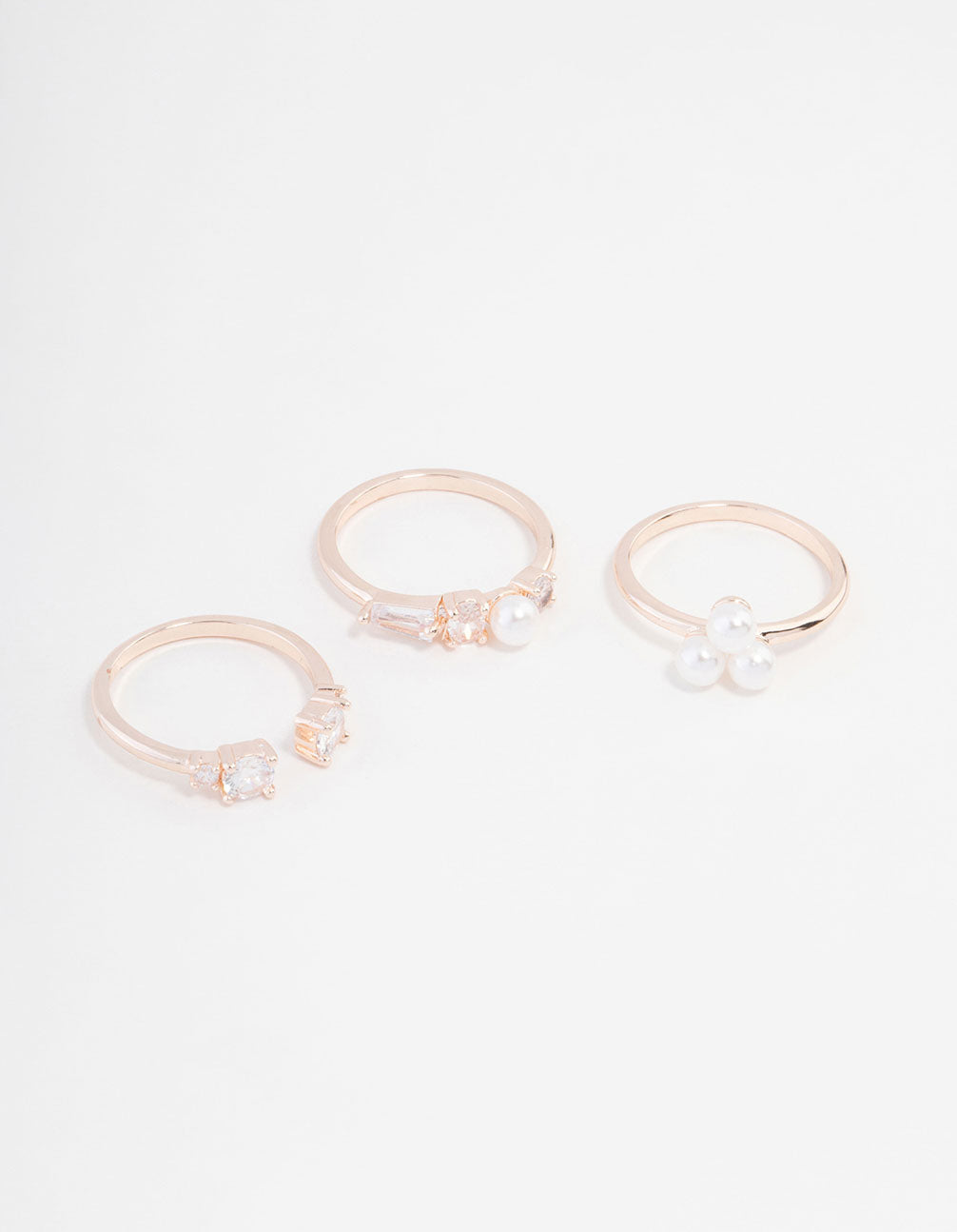 Showcasing a rose gold plated ring 3-pack featuring pearl and cubic zirconia front view
