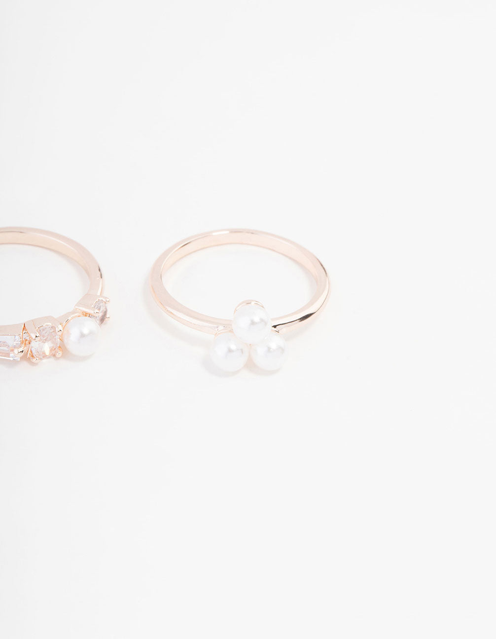 Elegant rose gold plated ring 3-pack with pearl and cubic zirconia close up view