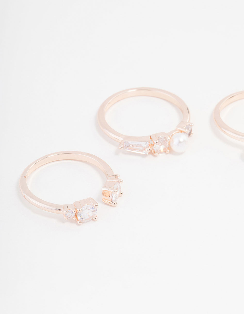 Detailed rose gold plated ring 3-pack featuring pearl and cubic zirconia side detail view
