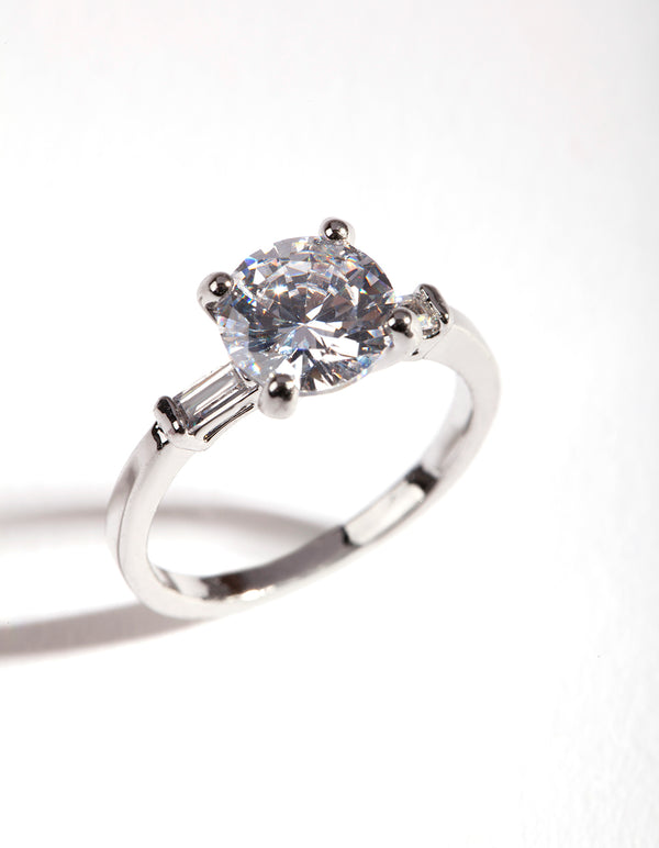 Showcasing a silver cubic zirconia round stone band ring with prong setting front view