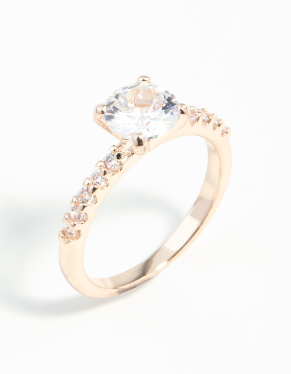 Beautifully crafted rose gold diamante engagement ring featuring statement design side detail view