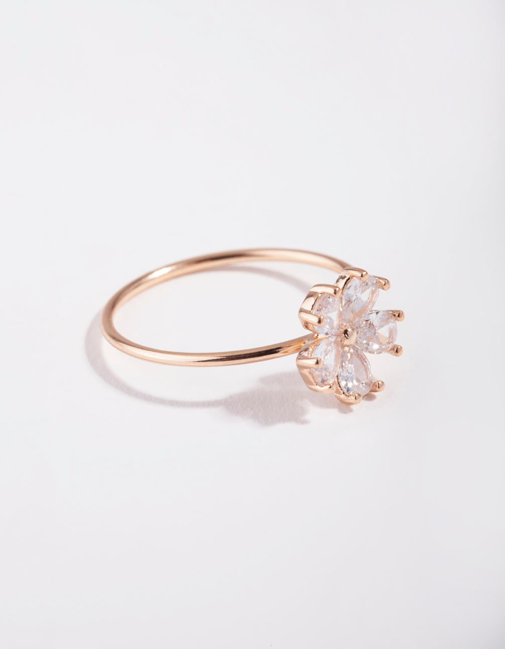 Elegant floral cubic zirconia ring in rose gold with daisy design front view
