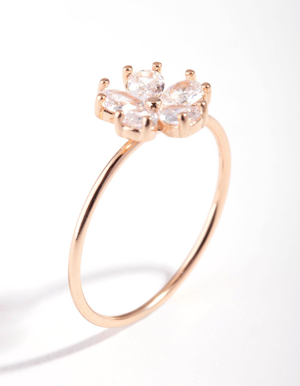 Exquisite rose gold cubic zirconia daisy ring showcasing prong setting side detail view