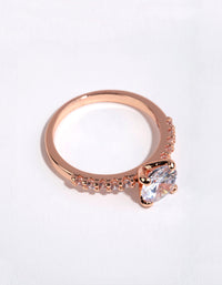 Elegant rose gold plated cubic zirconia round band ring featuring prong setting and pavé details front view - link has visual effect only