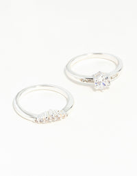 Showcasing a silver plated stackable ring set with round cut cubic zirconia stones front view - link has visual effect only