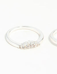 Highlighting silver plated stackable rings featuring round cut cubic zirconia in white close up view - link has visual effect only