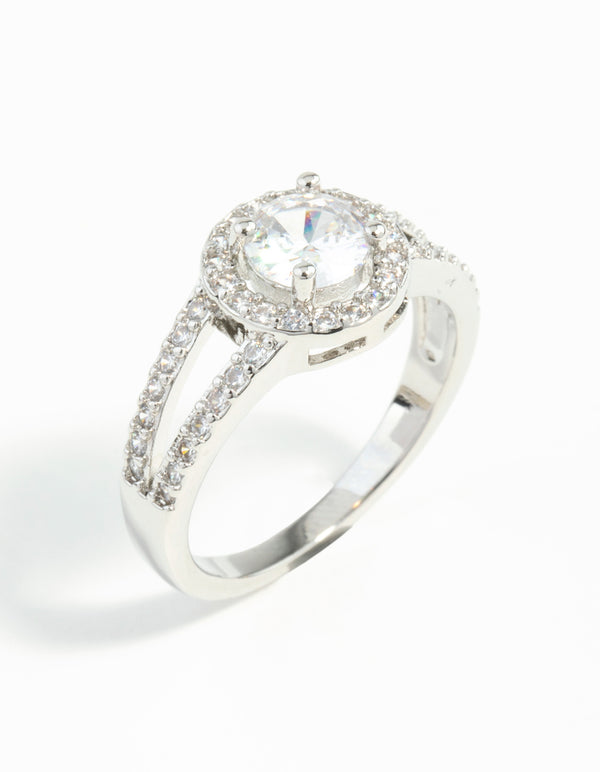 Designed with silver plated material, this cubic zirconia halo ring in clear side detail view