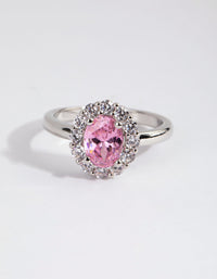 Elegant silver pink cubic zirconia oval ring with light halo setting close up view - link has visual effect only