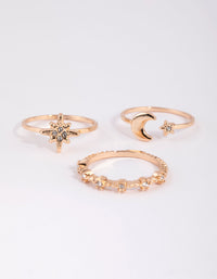 Beautiful gold stacking rings in a 3-pack featuring celestial star details close up view - link has visual effect only