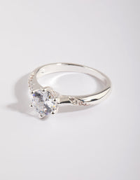 Elegant silver plated twisted ring with cubic zirconia in a dainty style front view - link has visual effect only