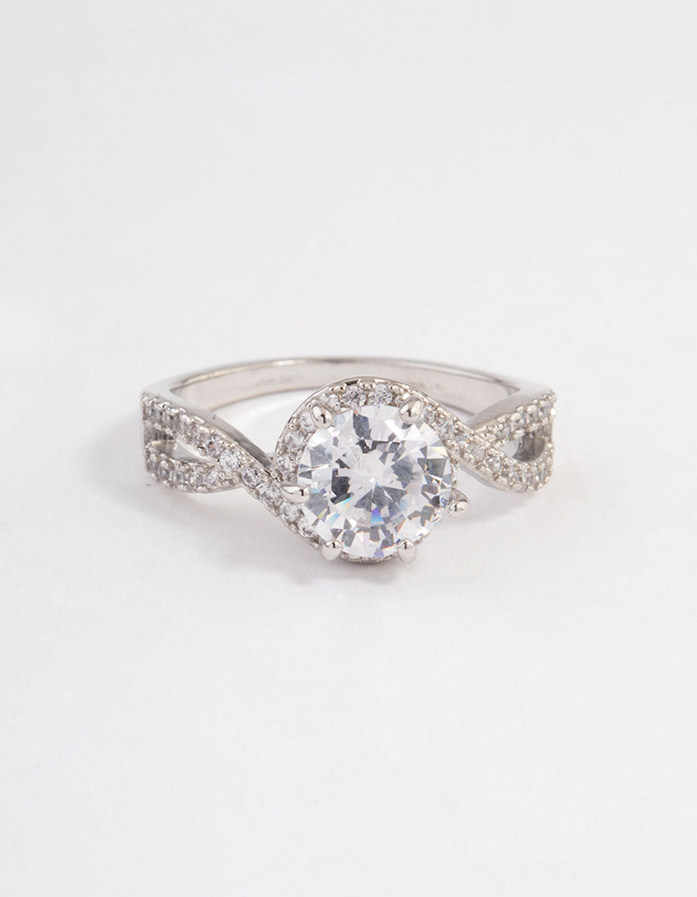 Elegantly designed round infinity halo ring featuring crystal in silver close up view
