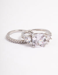 Showcasing a triple stone ring set in silver featuring clear gemstones front view - link has visual effect only