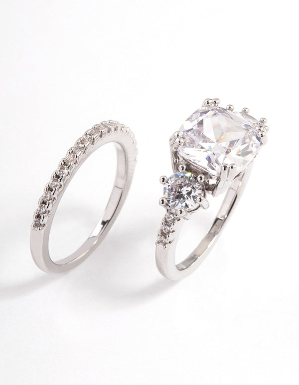 Elegant triple stone ring set crafted from silver with clear gemstones side detail view