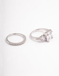 Beautifully designed triple stone ring set in silver with clear gemstones close up view - link has visual effect only