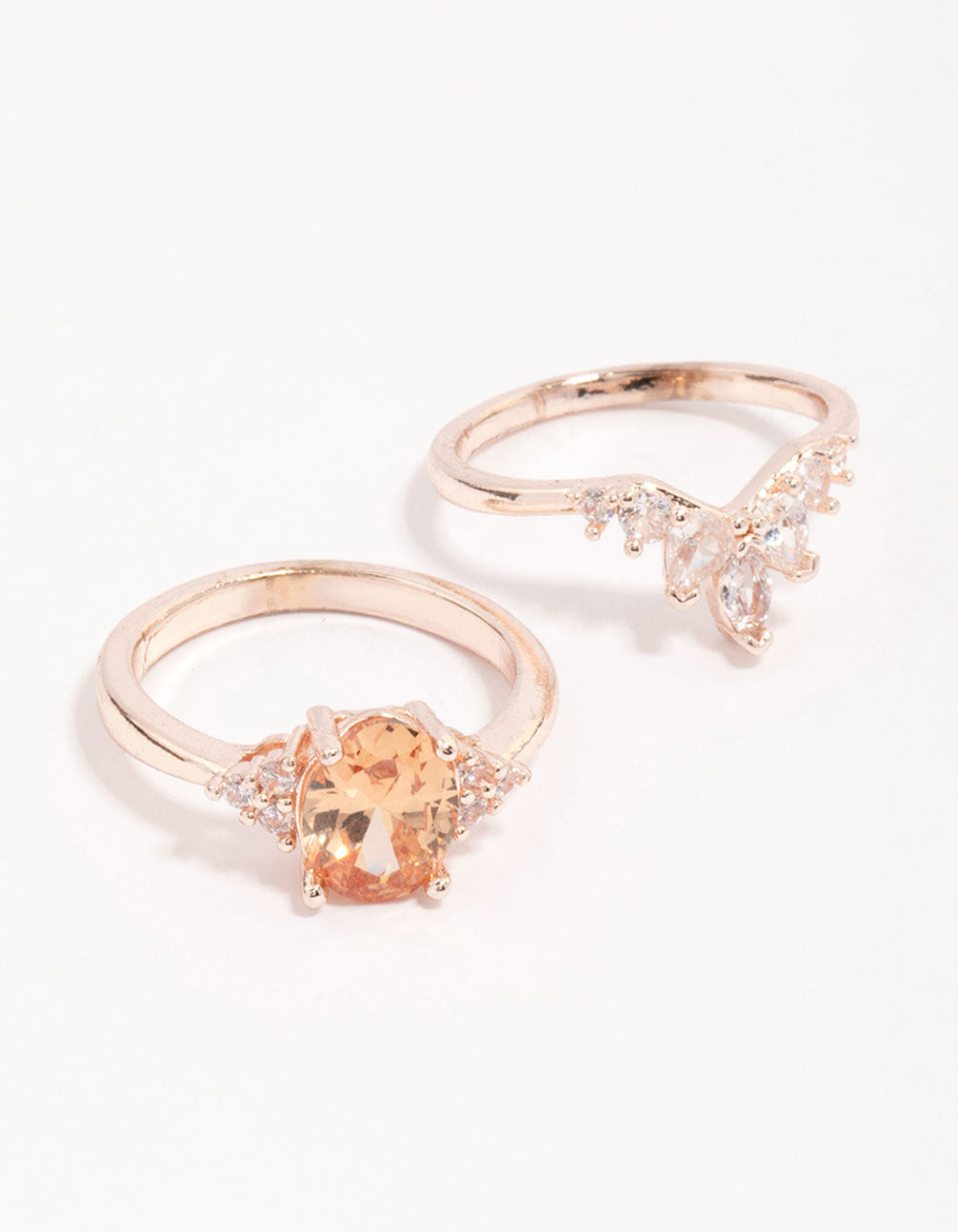 Showcasing a rose gold arched ring pack dainty style front view