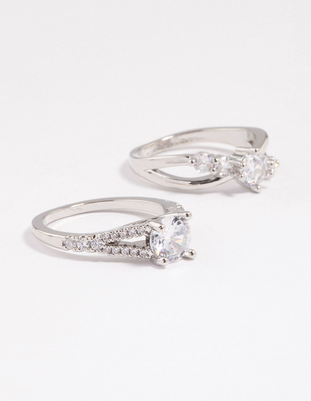 Showcasing a diagonal cubic zirconia engagement ring pack crafted from dainty material in silver front view
