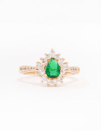 Showcasing a gold plated regal ring with pear cut cubic zirconia in green and clear close up view - link has visual effect only