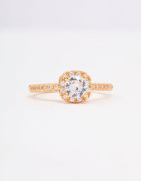 Featuring a gold plated mini cushion cubic zirconia engagement ring with halo setting and stone accents close up view - link has visual effect only
