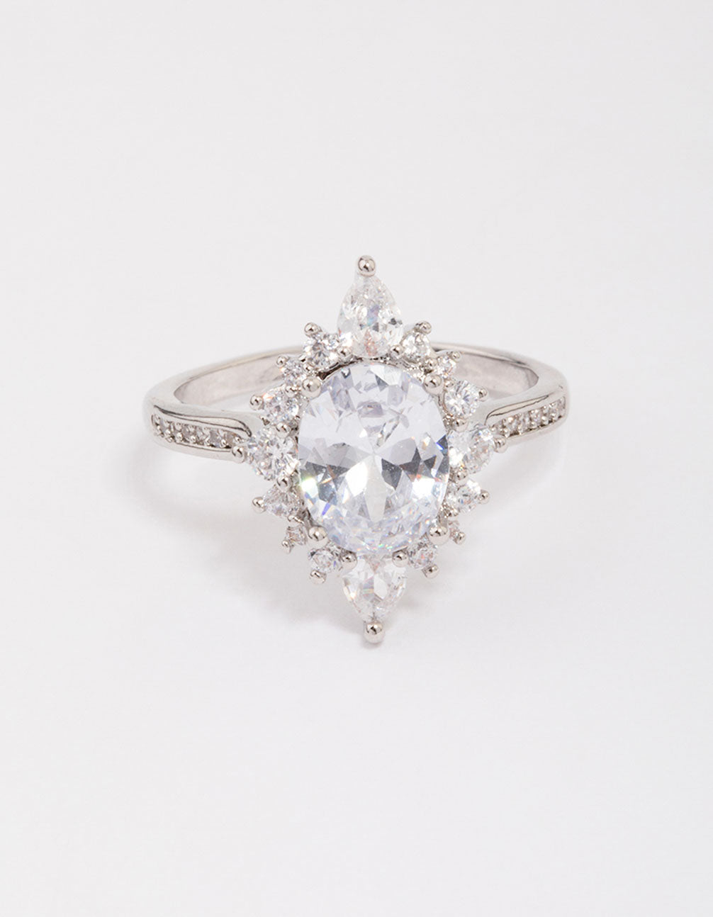 Designed with silver shining star cubic zirconia ring featuring oval cut crystal stones and clear accents close up view