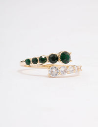 Stunning overlapping ring in gold featuring emerald cut cubic zirconia close up view - link has visual effect only