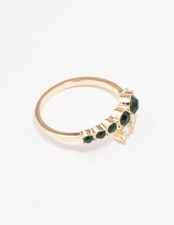 Beautifully crafted overlapping ring in gold featuring emerald cut cubic zirconia side detail view