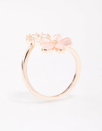 Featuring a rose gold double daisy wrapped ring with floral design side detail view - link has visual effect only