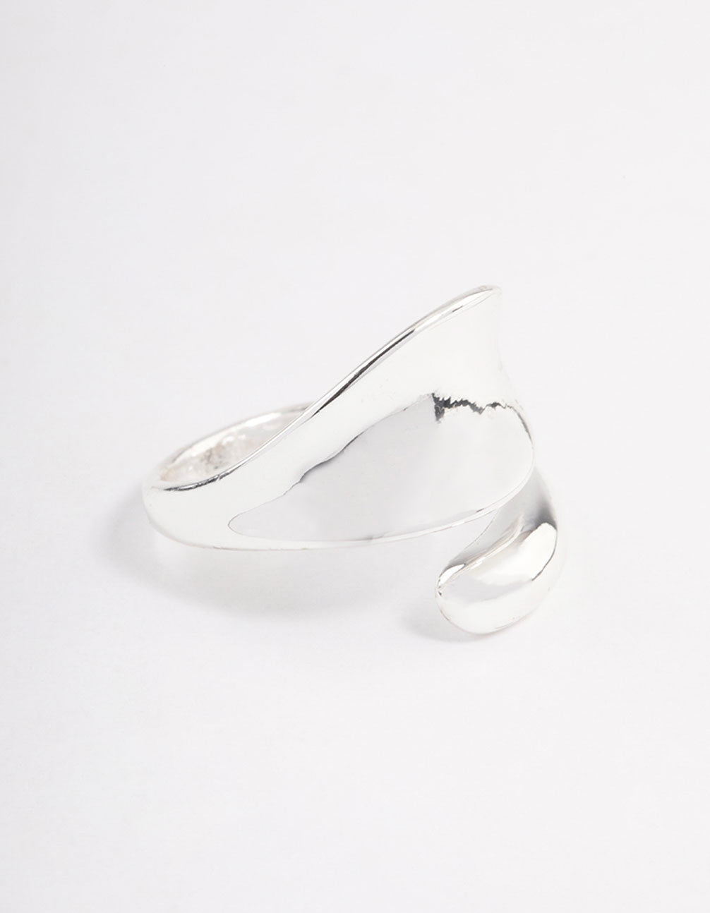 Showcasing a bold wrapped ring crafted from silver plated material side detail view