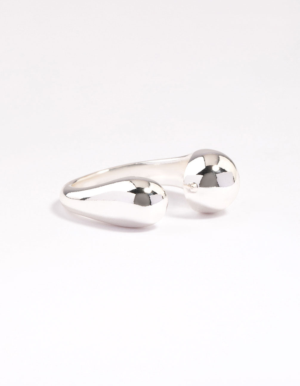 Showcasing a silver plated open sphere ring side detail view