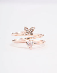 Highlighting a rose gold plated butterfly and heart wrapped ring close up view - link has visual effect only