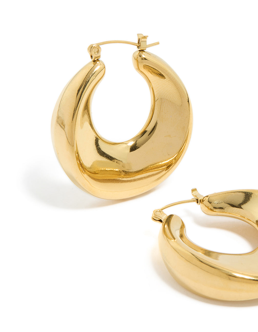 Detailed waterproof gold plated stainless steel large hoop earrings with closure mechanism close up view