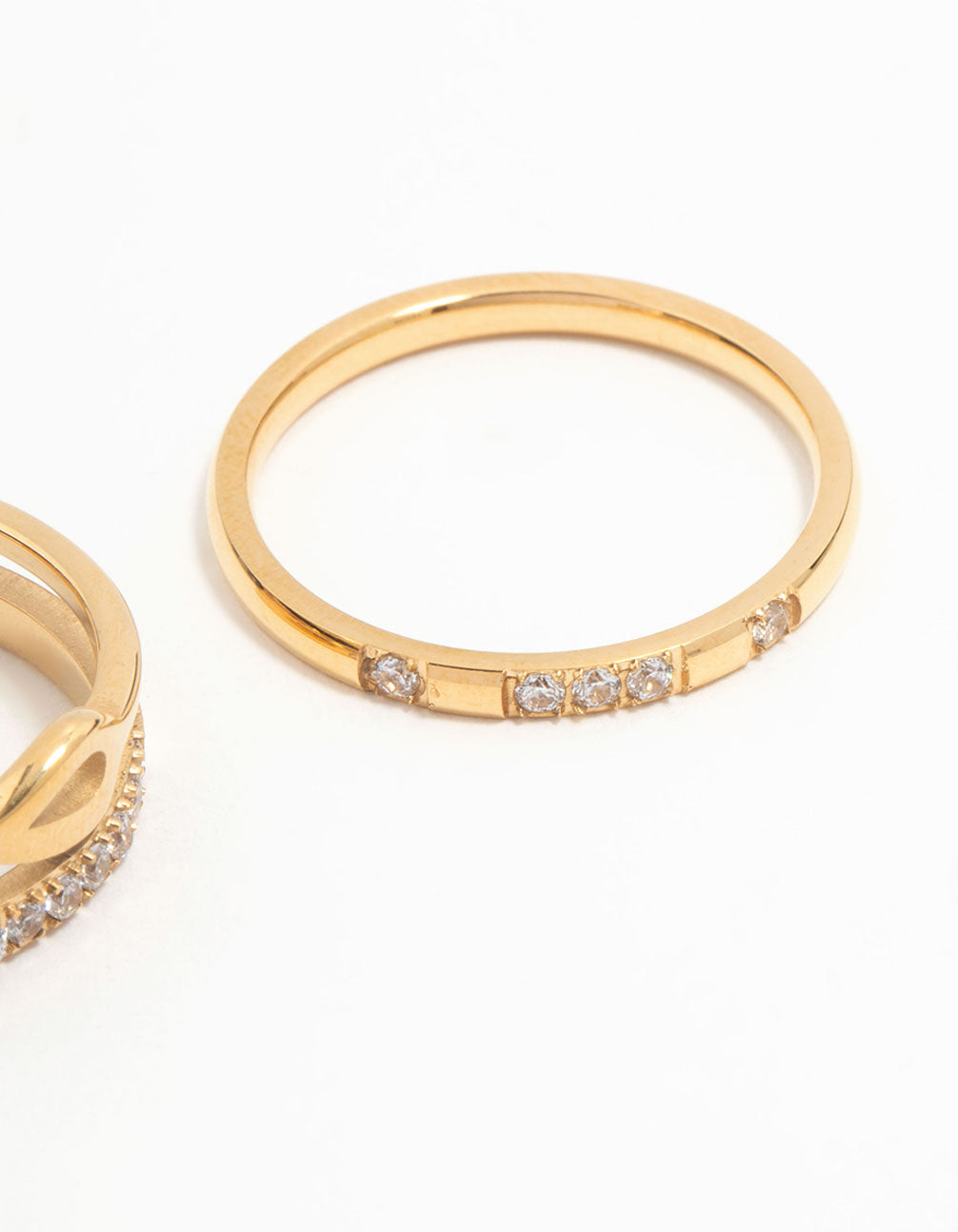 Highlighting waterproof gold plated stainless steel infinity rings in a 3-pack side detail view