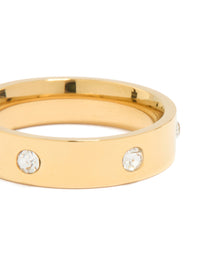 Highlighting a waterproof gold plated stainless steel cocktail band ring featuring cubic zirconia close up view - link has visual effect only