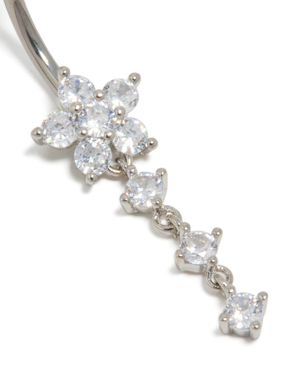 Detailed look at a titanium belly bar with floral charm featuring round cut cubic zirconia in silver and clear detail view