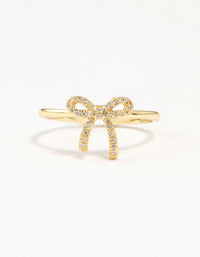 Elegantly designed cubic zirconia in gold plated sterling silver ring featuring bow detail close up view - link has visual effect only