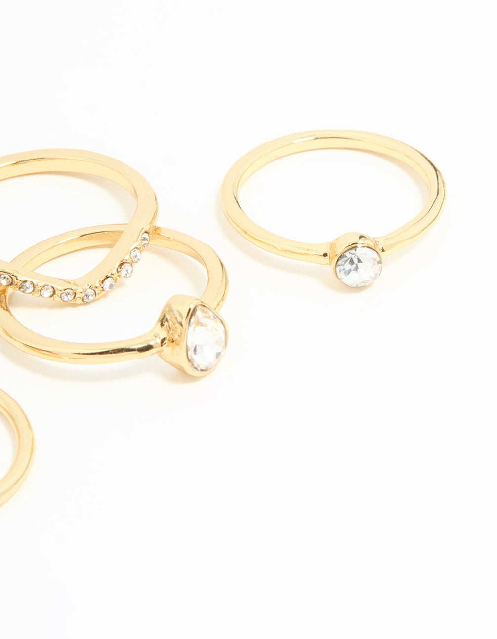 Elegantly designed square and pear diamante rings 5-pack in gold plated metal with pear stone cut side detail view